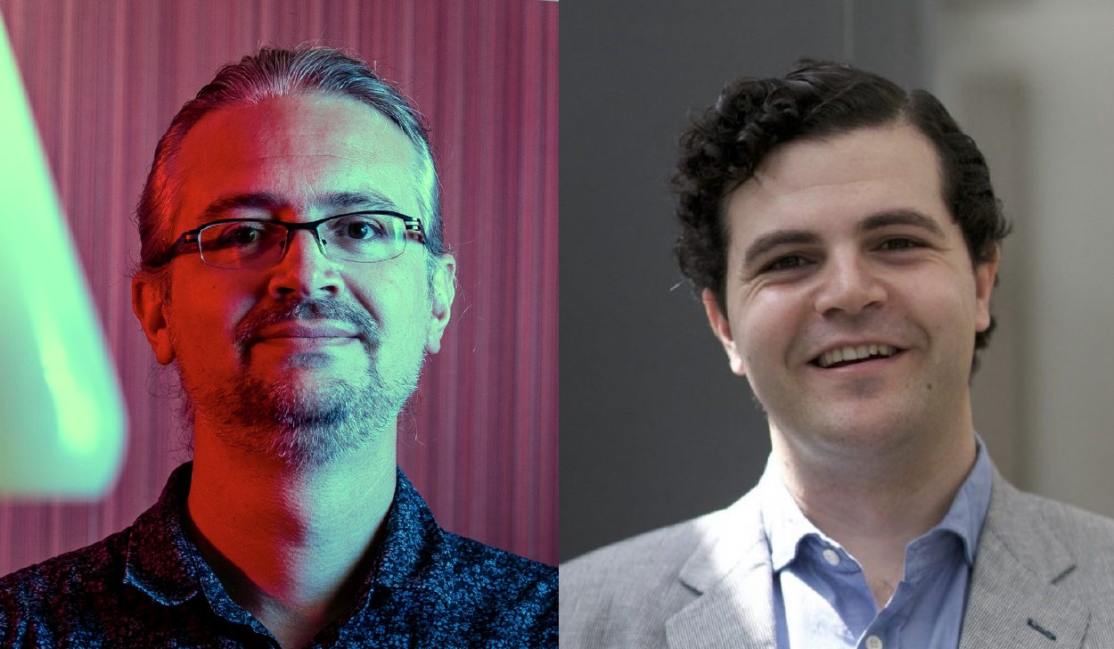 Two side-by-side portraits of men, one with a beard and glasses against a pinkish light background, and the other smiling without glasses against a neutral background.