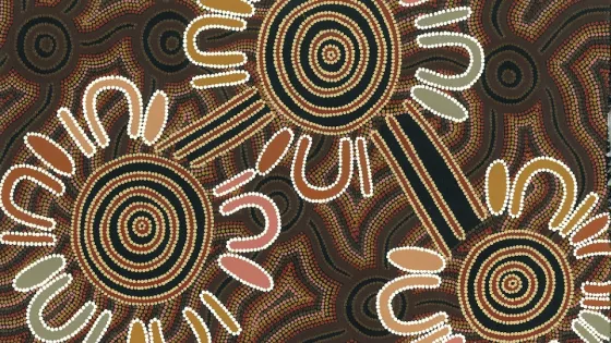 An abstract painting featuring intricate dot patterns forming circular and waveform designs in a rich array of earthy tones.