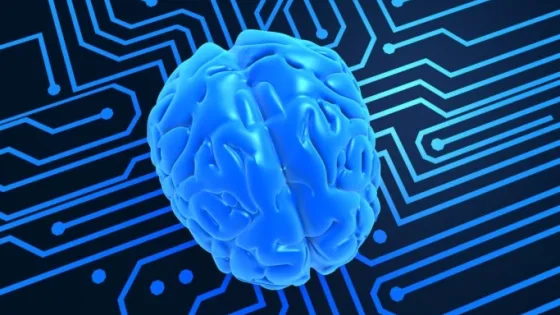A digital illustration of a blue brain floating over a circuit board pattern in black and blue tones.
