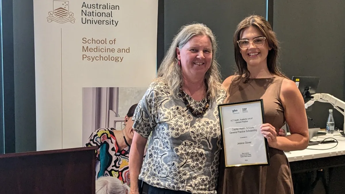 Jessica Glover received a Capital Health Network General Practice scholarship certificate from Clinical Professor Katrina Anderson