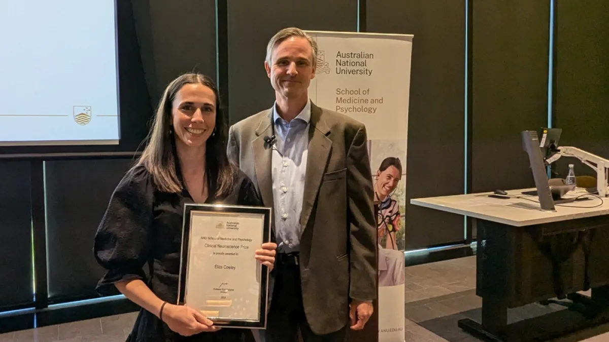 Eliza Cowley received the Clinical Neuroscience Prize from Professor Paul Fitzgerald