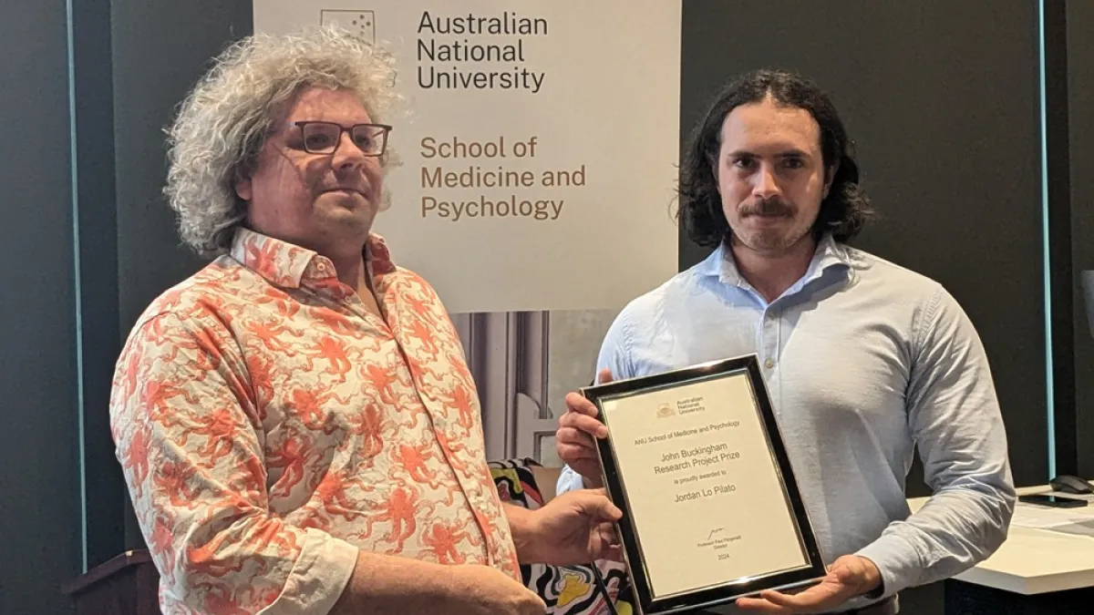 Jordan Lo Pilato received the John Buckingham Research Project Prize from Dr Nathan Emmerich