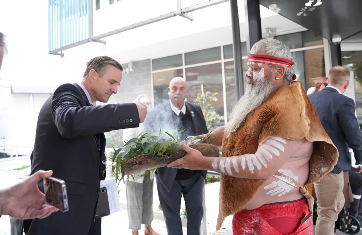 Professor Paul Fitzgerald, Director, School of Medicine and Psychology participates in the Smoking Ceremony led by Uncle Duncan Smith, Wiradjuri Echoes