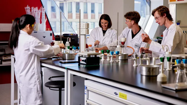Students complete experiments in one of the medical labs