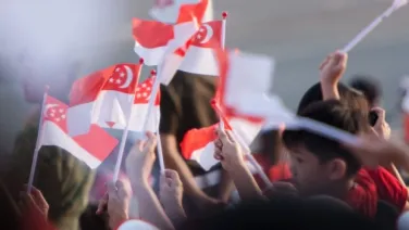 Crowd with Singaporean flags